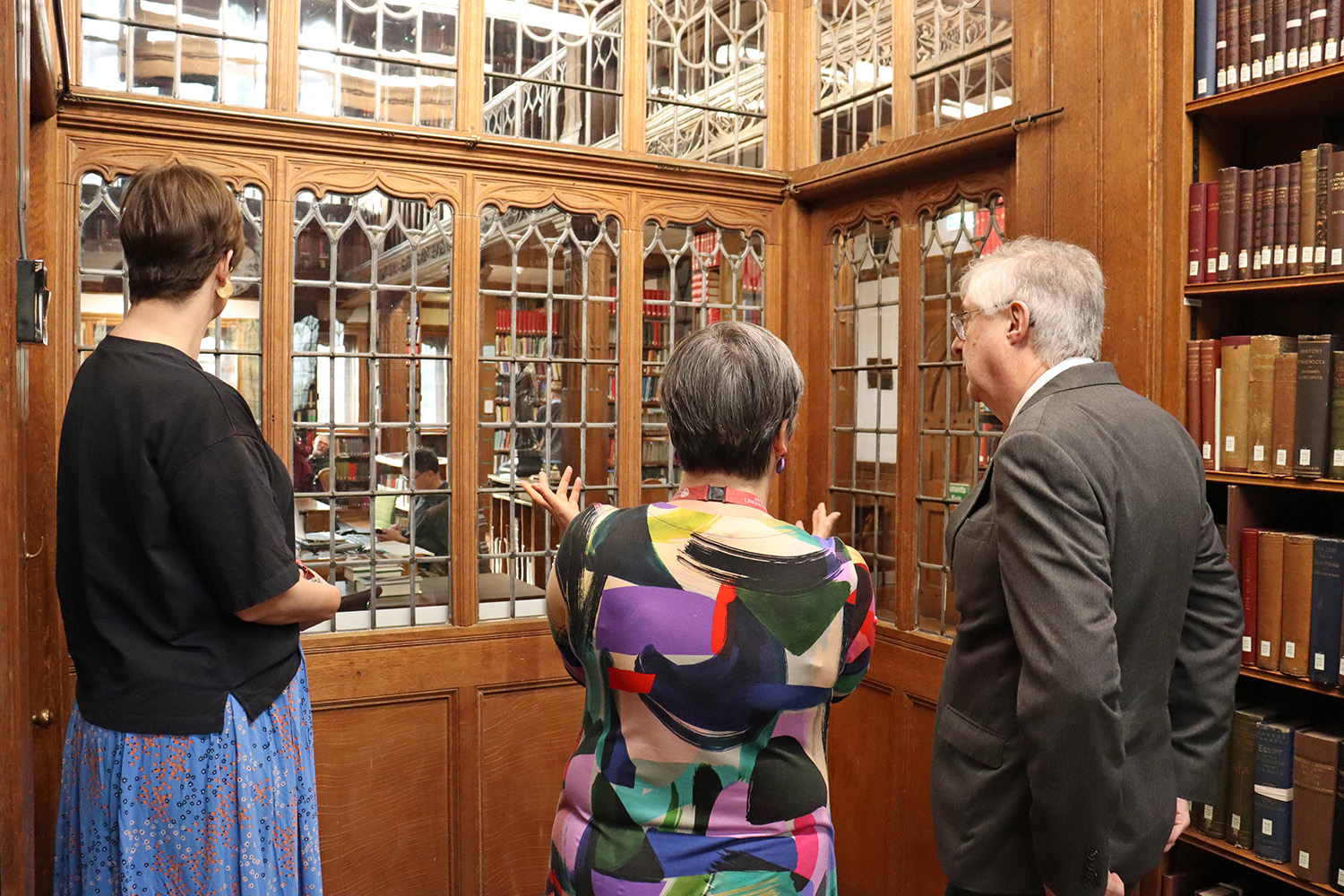 Mark Drakeford, Andrea Russell and Louisa Yates in the Reading Rooms vestibule